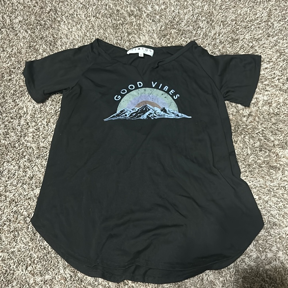 Very soft and stretchy v-neck t shirt. Size is medium and brand is HIA TUS